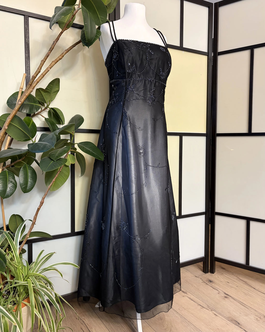 Black gradient dress richly decorated with floral beadwork