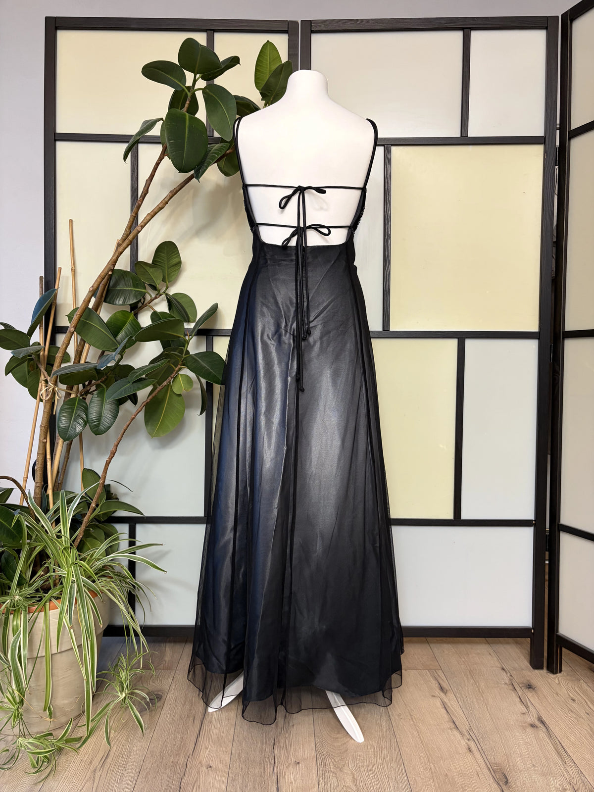 Black gradient dress richly decorated with floral beadwork