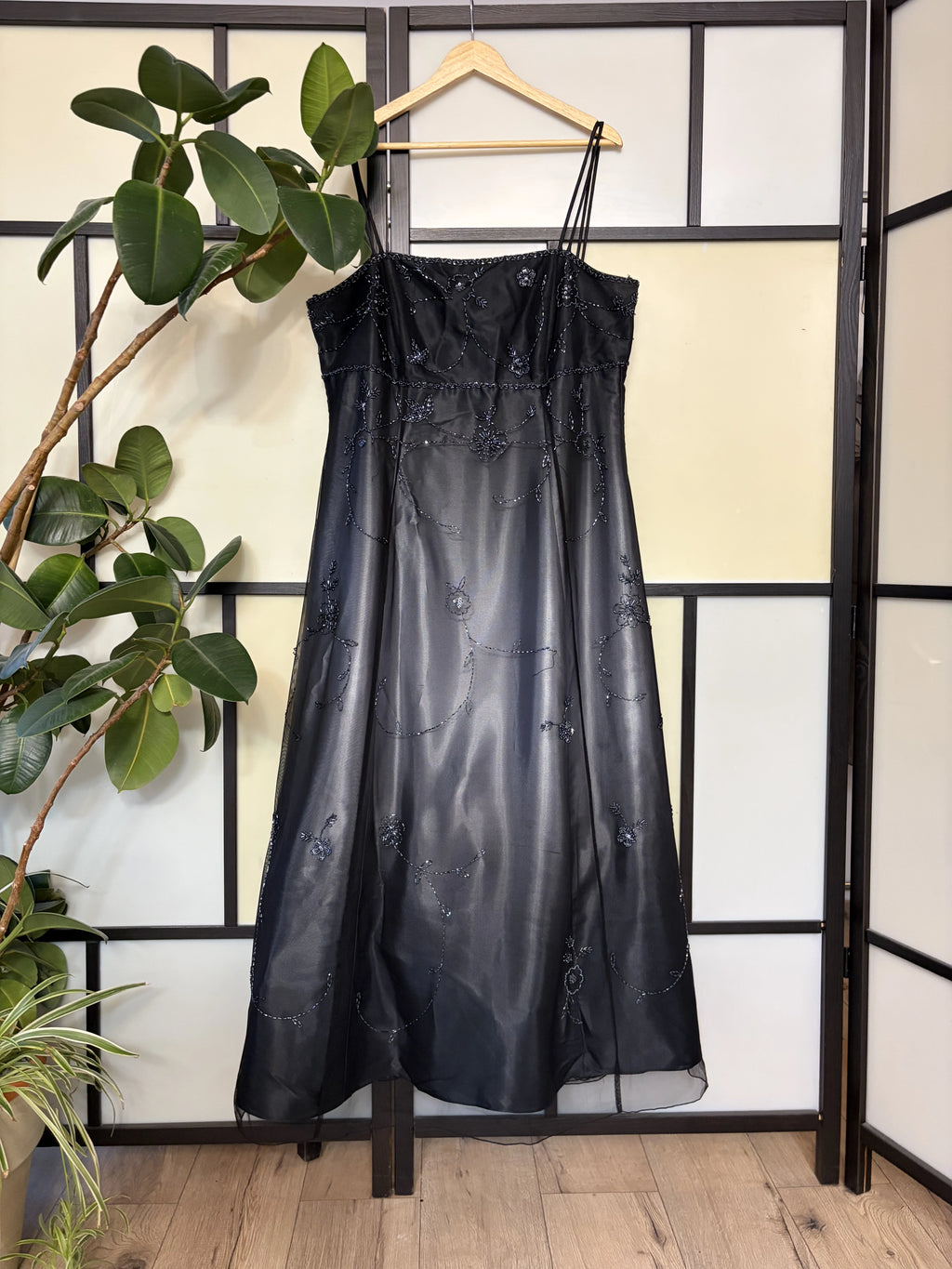 Black gradient dress richly decorated with floral beadwork