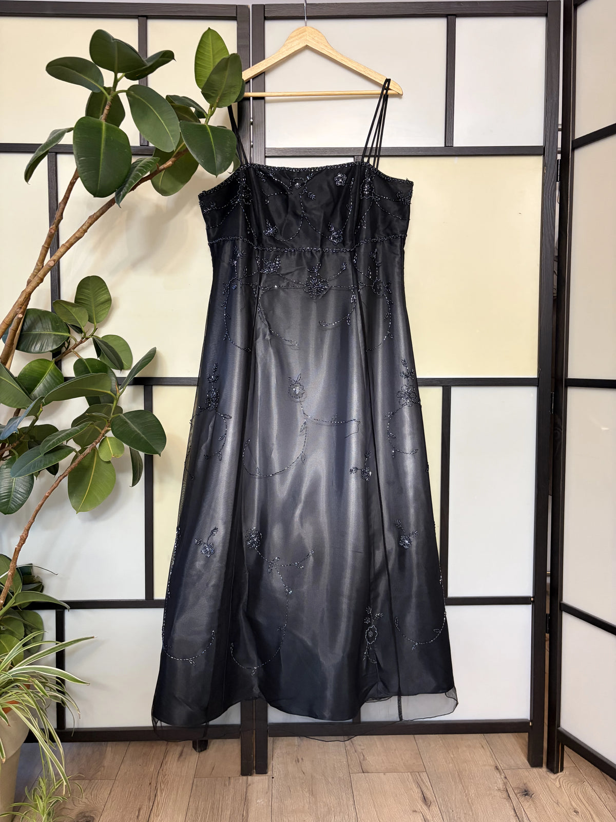 Black gradient dress richly decorated with floral beadwork