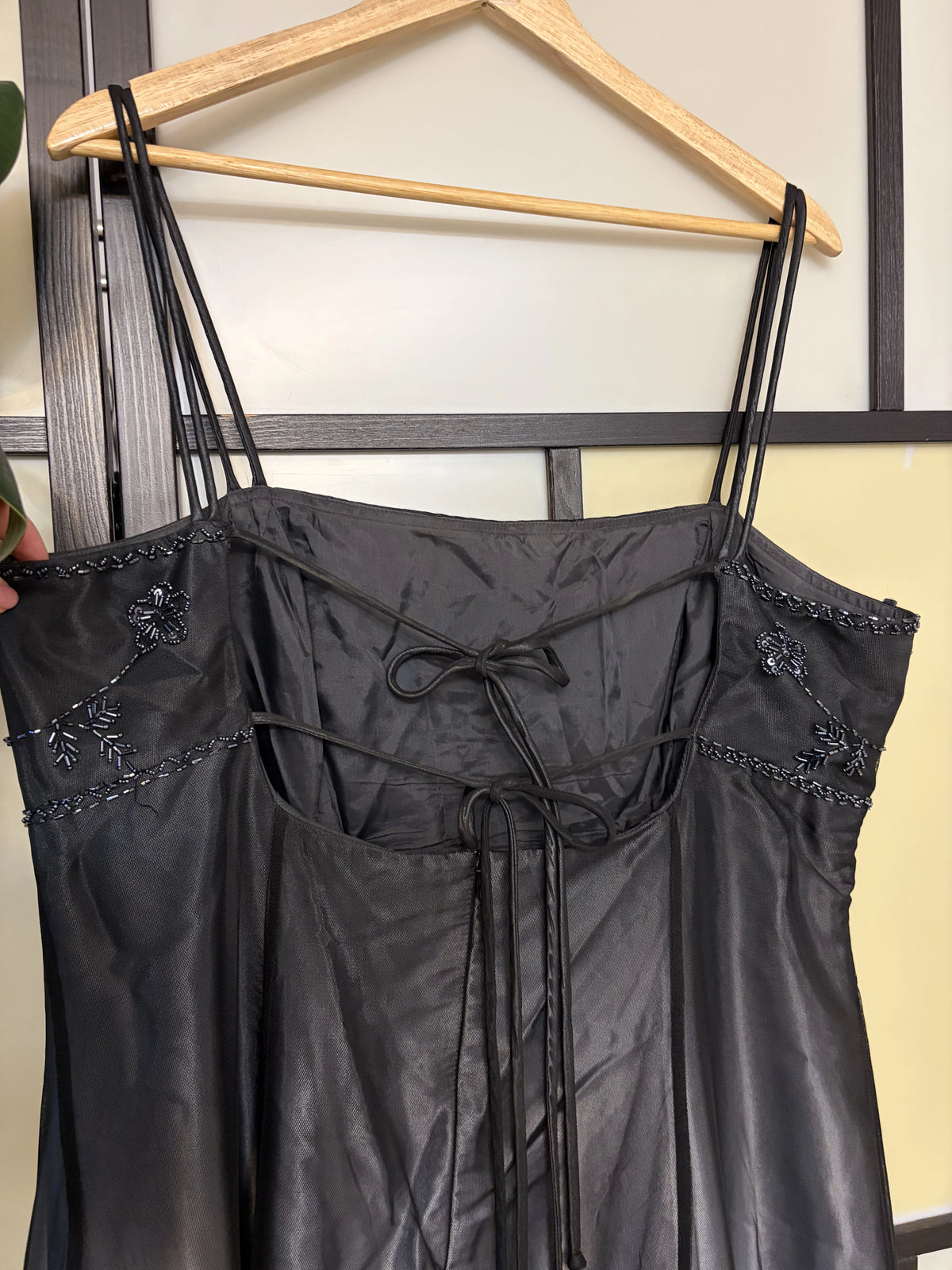 Black gradient dress richly decorated with floral beadwork