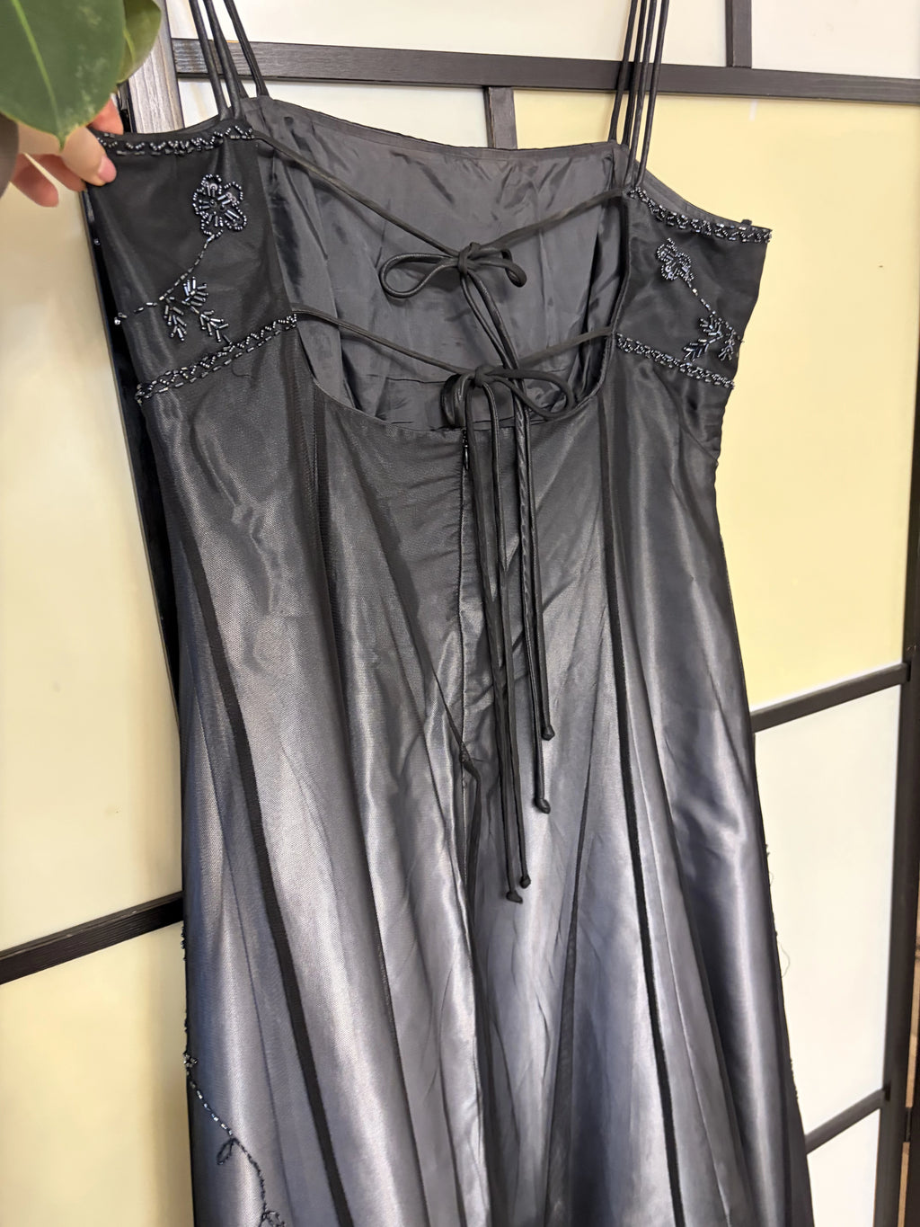 Black gradient dress richly decorated with floral beadwork