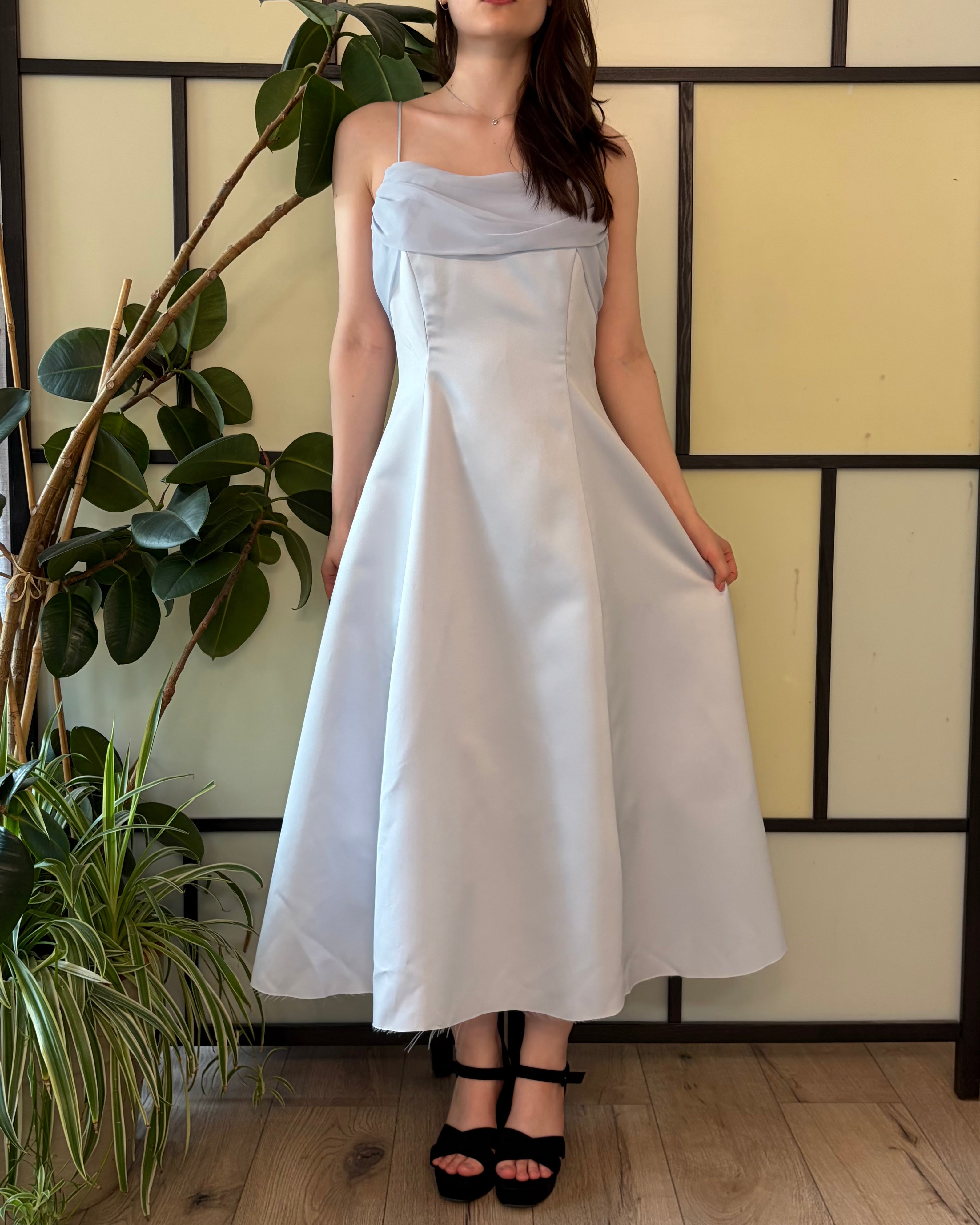 Blue midi dress with delicate straps and short flutter sleeves