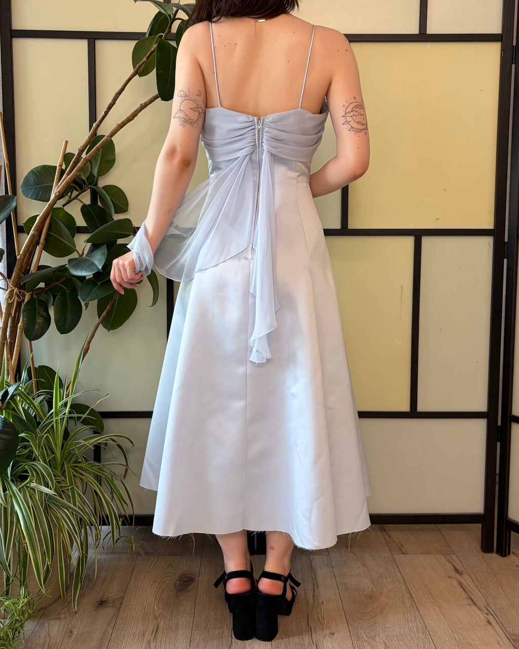 Blue midi dress with delicate straps and short flutter sleeves