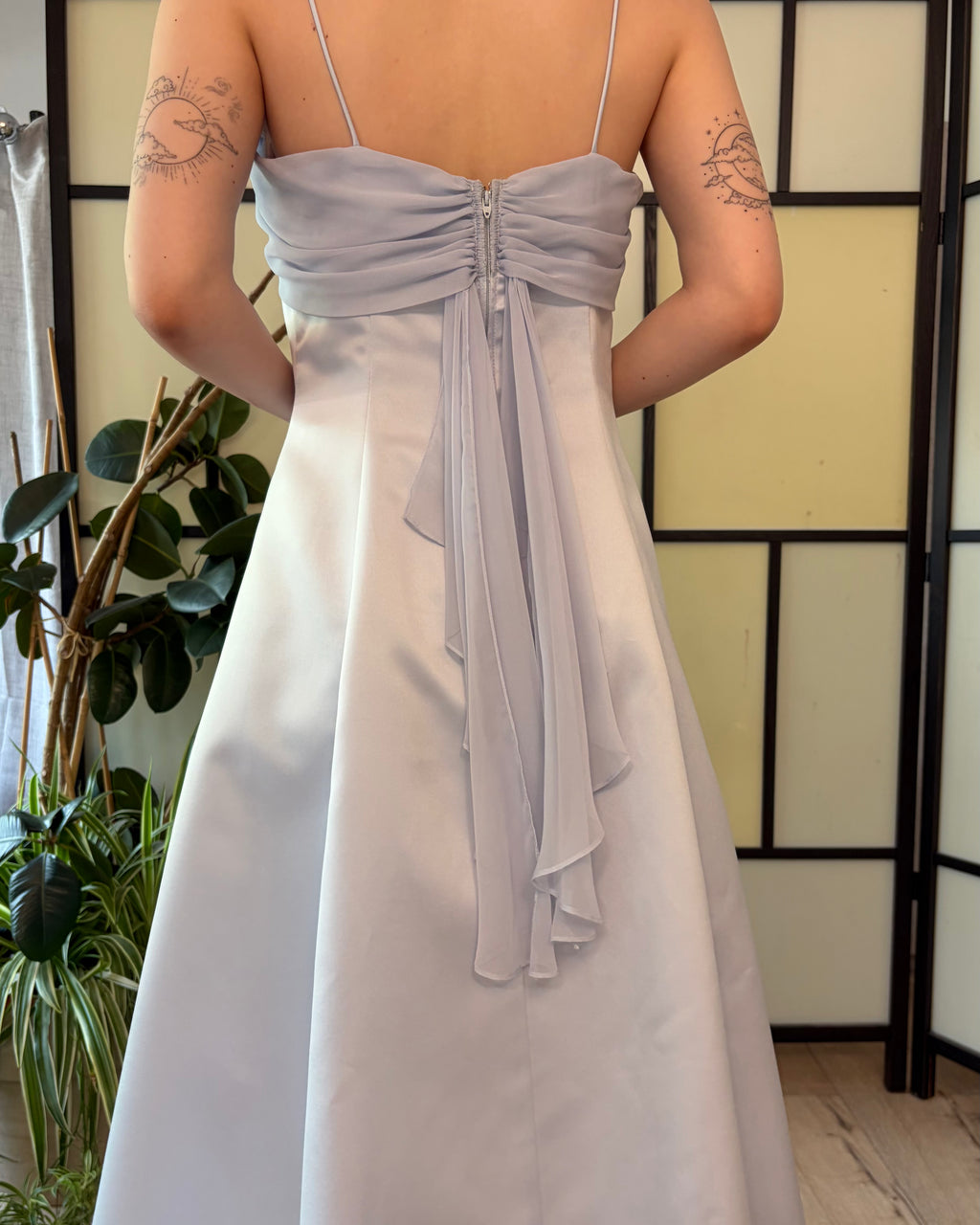 Blue midi dress with delicate straps and short flutter sleeves